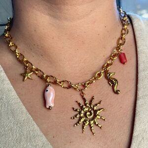 Gold Charm Necklace with Pink and Red Accents